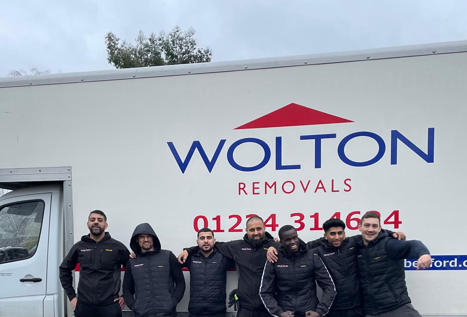 The Wolton Removals team in front of one of our Bedford trucks
